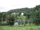 Residence halls from across Airthrey Loch.